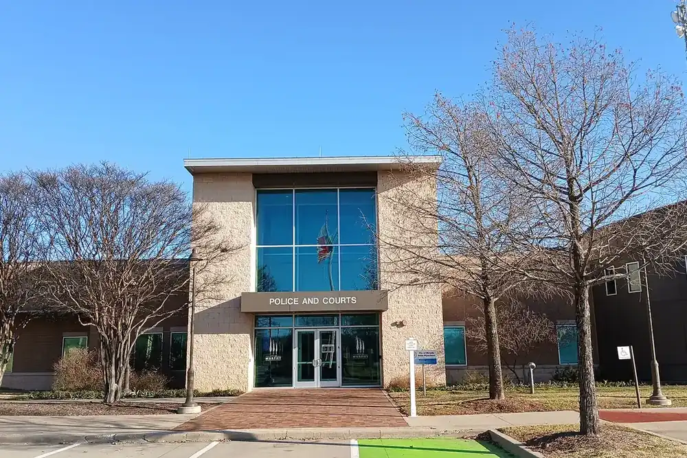 Murphy municipal court and police building with a glass entrance in Murphy, Texas